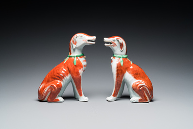 A pair of Chinese polychrome export porcelain models of dogs, Qianlong