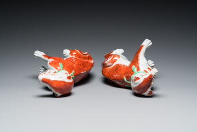 A pair of Chinese polychrome export porcelain models of dogs, Qianlong