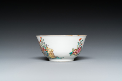 A Chinese Dutch market famille rose cup and saucer with the arms of van Isselmuden and van Haersolte, Qianlong
