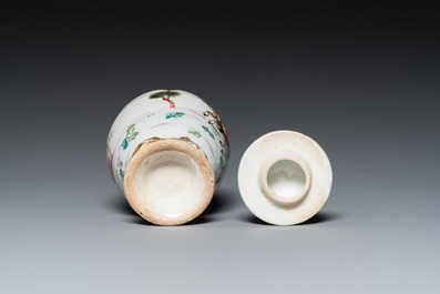 Three Chinese famille rose 'horserider' cups and saucers with the matching tea caddy, Yongzheng/Qianlong