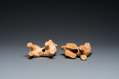 Two Chinese 'mingqi' painted pottery models of dogs, Han