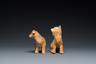 Two Chinese 'mingqi' painted pottery models of dogs, Han