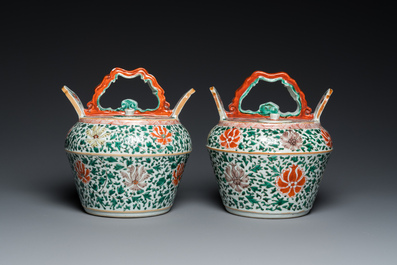 A pair of Chinese famille verte lime pots and covers, Kangxi