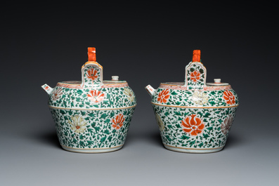 A pair of Chinese famille verte lime pots and covers, Kangxi