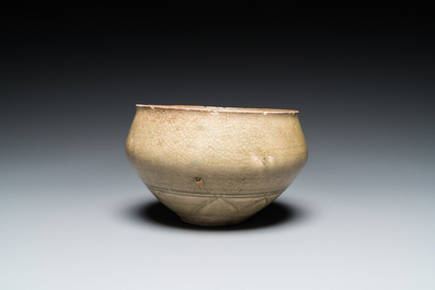 A Chinese Yaozhou celadon 'lotus' bowl, Song/Yuan