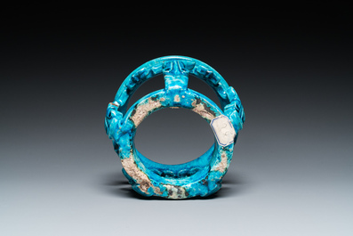 A Chinese monochrome turquoise-glazed reticulated ornament for use in a fish bowl, Kangxi