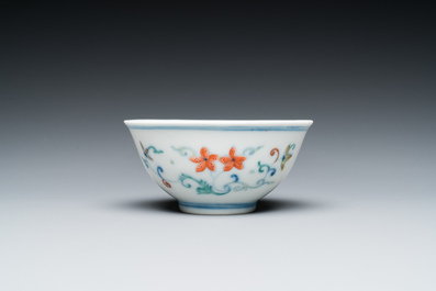 A Chinese doucai bowl with floral design, Yongzheng mark and possibly of the period