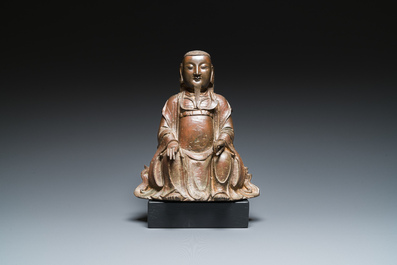 Een Chinese bronzen Zhen Wu met sporen van lakwerk, Ming