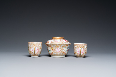 A Chinese famille rose covered bowl, a saucer and two cups with a hunting scene, Qianlong