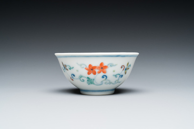 A Chinese doucai bowl with floral design, Yongzheng mark and possibly of the period