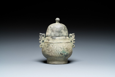 A Chinese bronze 'you' ritual wine ewer, Zhou, ca. 11th-9th C. b.C.