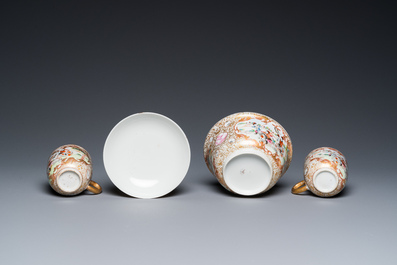 A Chinese famille rose covered bowl, a saucer and two cups with a hunting scene, Qianlong