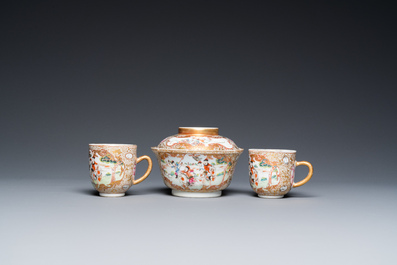 A Chinese famille rose covered bowl, a saucer and two cups with a hunting scene, Qianlong