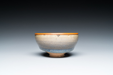 A Chinese junyao bowl with brass rim mount, Song