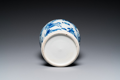 A Chinese blue and white 'Mongolian hunt' jar with wooden cover, Kangxi