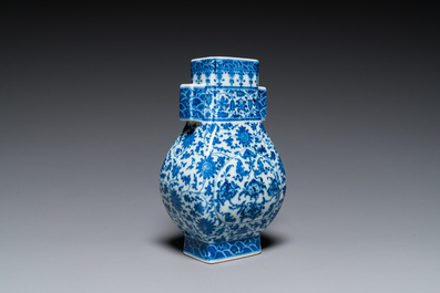 A Chinese blue and white 'fanghu' vase with lotus scrolls, Qianlong mark, 19/20th C.