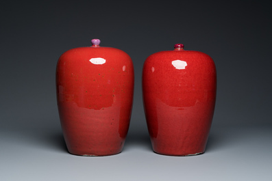 A pair of Chinese sang-de-boeuf-glazed covered jars, 19th C.
