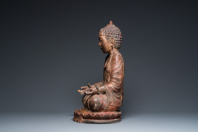 A gilded and lacquered wood sculpture of a praying ascetic, probably Thailand, 18th C.