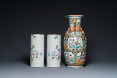 A pair of Chinese famille rose hat stands and a Canton famille rose vase, 19/20th C.