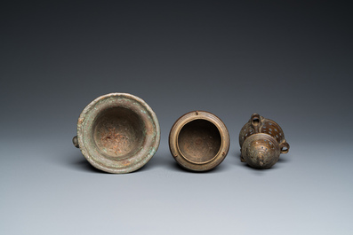 A bronze mortar, a censer and two pax of which one gilded, Western Europe, 16/17th C.