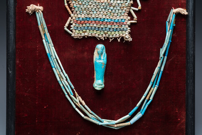 An Egyptian faience bead mummy mask, an ushabti and a necklace, Ptolemaic period