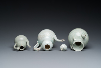 Three Chinese celadon- and qingbai-glazed jugs, Song and later