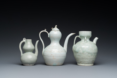 Three Chinese celadon- and qingbai-glazed jugs, Song and later