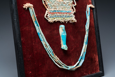 An Egyptian faience bead mummy mask, an ushabti and a necklace, Ptolemaic period
