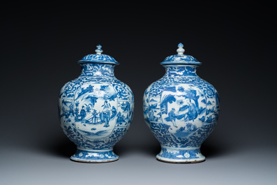 A pair of Chinese blue and white vases and covers with figurative design, Ming