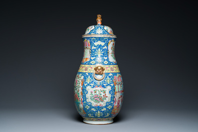 A Chinese Canton famille rose blue-ground vase and cover, 19th C.