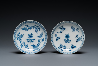 A pair of Chinese blue and white cups and saucers, Chenghua mark, Kangxi