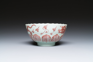A Chinese lotus-molded 'dragon' bowl in copper-red on celadon-ground, Kangxi