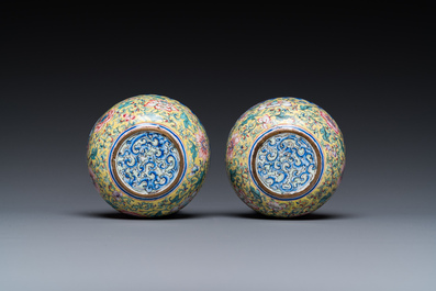 A pair of Chinese yellow-ground Canton enamel bowls, Qianlong/Jiaqing