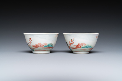 A pair of Chinese famille rose 'European subject' cups and saucers, Qianlong