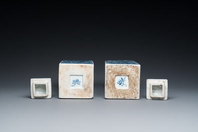 A pair of Chinese blue and white square 'narrative subject' vases and covers, Kangxi