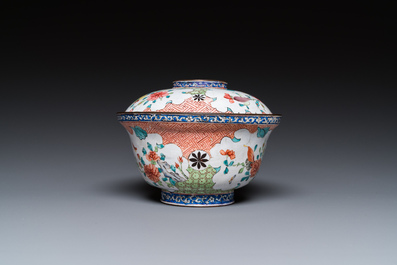 A Chinese Canton enamel covered bowl with flowers and butterflies, Yongzheng/Qianlong