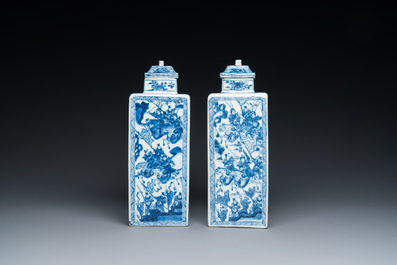 A pair of Chinese blue and white square 'narrative subject' vases and covers, Kangxi