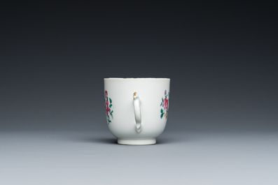 A Chinese famille rose 'European subject' cup and saucer, Qianlong