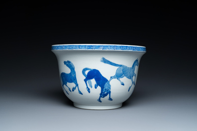 A Chinese blue and white 'Eight horses of Mu Wang' jardini&egrave;re, Kangxi mark, 19/20th C.