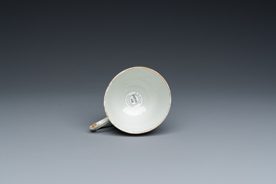 A Chinese famille rose 'European subject' cup and saucer, Qianlong