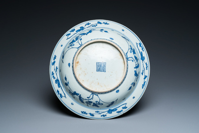 A Chinese blue and white dish with floral design, Longqing mark and probably of the period