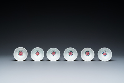 Twelve Chinese blue, white and famille rose cups and saucers, Kangxi/Yongzheng