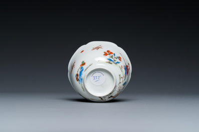 A Chinese famille rose 'elephant rider' cup and saucer, Yongzheng