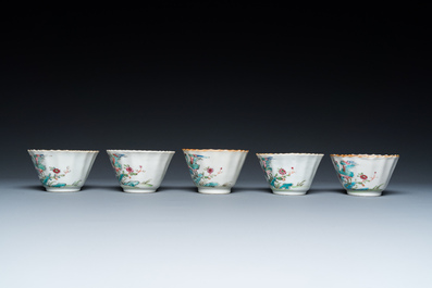 Five Chinese famille rose cups and saucers with a heron eating a fish, Qianlong