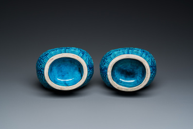 A pair of Chinese turquoise-glazed 'lotus' vases, 19th C.