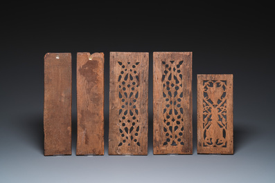 A collection of 11 carved wooden panels with various designs, France, Holland and/or Flanders, 14/16th C.