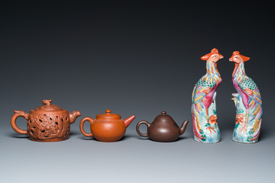 Three Chinese Yixing stoneware teapots with covers and a pair of famille rose pheasants, 19/20th C.