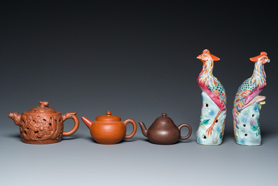 Three Chinese Yixing stoneware teapots with covers and a pair of famille rose pheasants, 19/20th C.