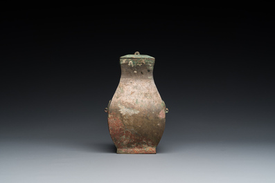 A small Chinese bronze ritual 'fang hu' vessel and cover, Warring States Period