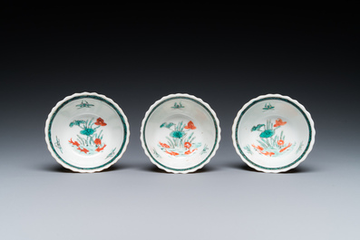 Three Chinese Kangxi-style caf&eacute;-au-lait-ground famille verte cups and saucers, rabbit mark, 19th C.